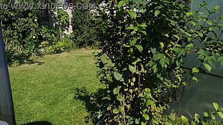 I spy on my stepmother, she is sunbathing naked in the yard