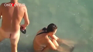 Beach Voyeur. Nude beach swingers foursome with wife exchange