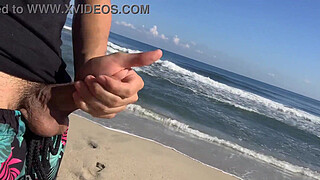 Exhibitionist voyeur flashes dick on public beach in front of two horny girls