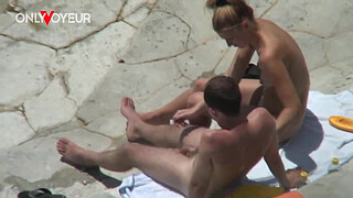 Beach Voyeur. Naughty young couple quick fuck on a rocky beach