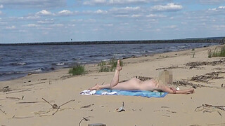 Mommy with a big ass fucked in all holes on the beach