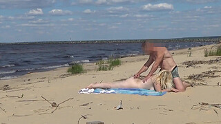 Mommy with a big ass fucked in all holes on the beach