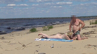 Mommy with a big ass fucked in all holes on the beach
