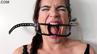 Extreme gag predicament - nailed to the wall