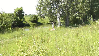 Milf sexy woman sunbathing naked on river bank. Random guy is watching. Naked in public. Public. Publicly. Wild beach Nudist. Perfect ass. Pussy. Blonde. Doggystyle. Woman got into doggy style position. Outdoor. Outside. Outdoors. Nudists. Naturist. POV