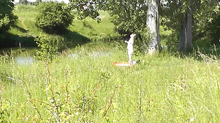 Milf sexy woman sunbathing naked on river bank. Random guy is watching. Naked in public. Public. Publicly. Wild beach Nudist. Perfect ass. Pussy. Blonde. Doggystyle. Woman got into doggy style position. Outdoor. Outside. Outdoors. Nudists. Naturist. POV