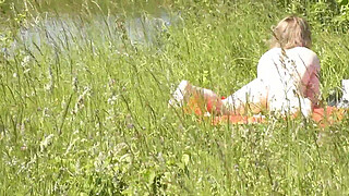 Milf sexy woman sunbathing naked on river bank. Random guy is watching. Naked in public. Public. Publicly. Wild beach Nudist. Perfect ass. Pussy. Blonde. Doggystyle. Woman got into doggy style position. Outdoor. Outside. Outdoors. Nudists. Naturist. POV