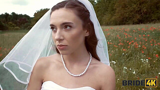 BRIDE4K. Pretty brunette bride fucks a horny shepherd in a summer field