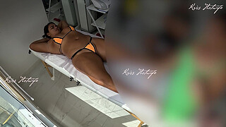 Giving a massage with a micro bikini stuffed in her pussy