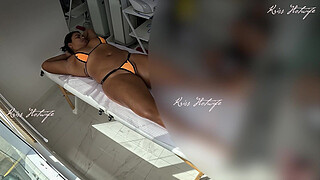 Giving a massage with a micro bikini stuffed in her pussy
