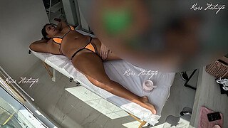 Giving a massage with a micro bikini stuffed in her pussy