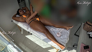 Giving a massage with a micro bikini stuffed in her pussy