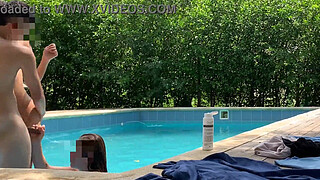 While I'm cleaning the pool my boss and his sister get naked and they get me naked too for some fun