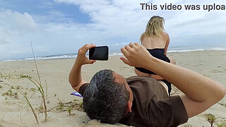 A fat dick in the ass perked up a milf dozing on the beach!