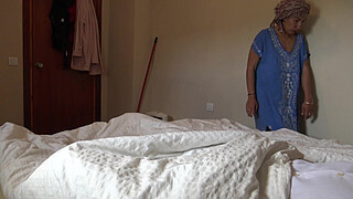 A Muslim hotel maid is disturbed when she sees his big black cock