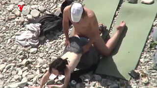 Beach Voyeur. Unashamed nudists having sex on the beach right near others