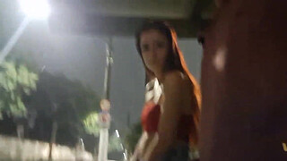 Risky handjob on the street for hot redhead at the bus stop