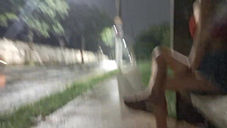 Risky handjob on the street for hot redhead at the bus stop