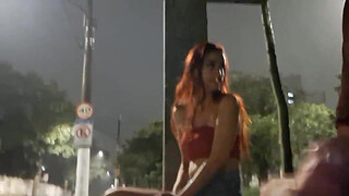 Risky handjob on the street for hot redhead at the bus stop