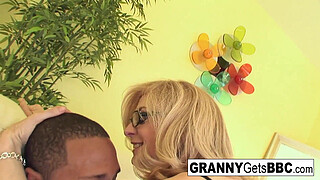 Busty blonde Nina Hartley gets fucked by a thick black cock