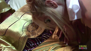 Busty blonde milf with enormous fake boobs and her friends are enjoying group sex during a costume party