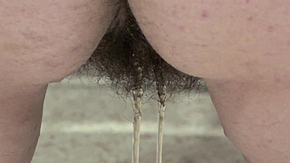 A hairy big pussy pees doggy style. Amateur fetish compilation with urine. PAWG.