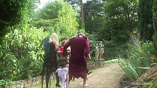 Her fantastic big tits are bouncing around the field while she is enjoying group sex