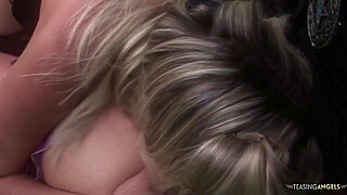 Her fantastic big tits are bouncing around the field while she is enjoying group sex