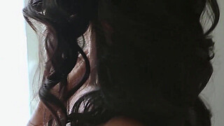 Busty ebony mature MILF strips to flaunt big juicy tits and booty