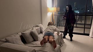 A masked stranger ties me by the neck and makes me suck her strap-on