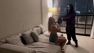 A masked stranger ties me by the neck and makes me suck her strap-on