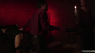 The blonde and brunette milfs with fake boobs have group sex in the creepy basement