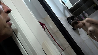 Peeking at the young girl in the shower