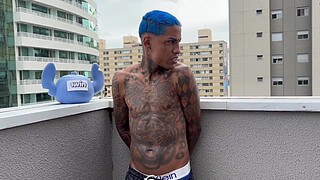 A young 18-year-old girl paying an intimate visit to a young, tattooed prisoner.