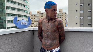 A young 18-year-old girl paying an intimate visit to a young, tattooed prisoner.