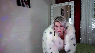 A lovely mature bitch flirts in a fur coat, and then gives us frantic masturbation with squirting!